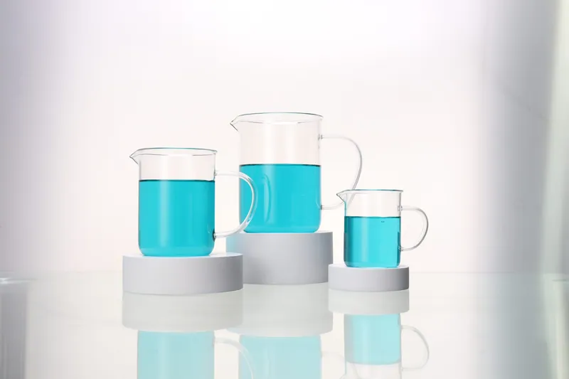 Beaker with handle and spout